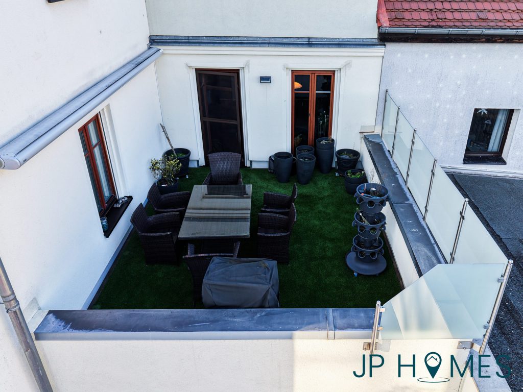 Exklusive 2-Zimmer-Maisonettewohnung mit Dachterrasse und Wasserzugang